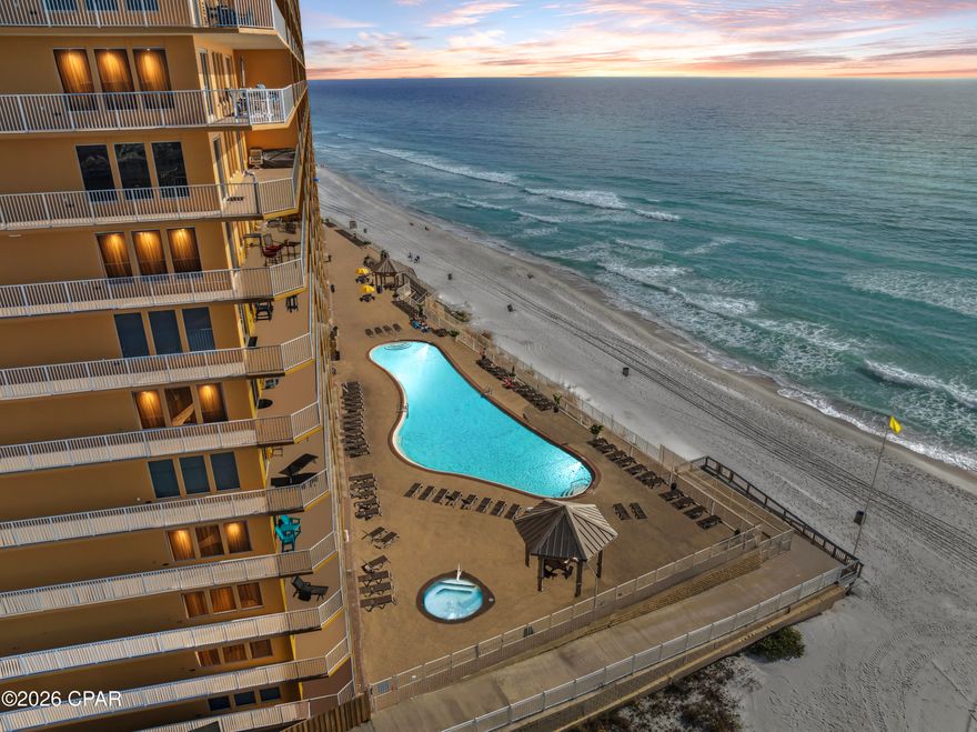 High-End Coastal Living Reimagined! Discover A RARE, a COMPLETELY RENOVATED absolutely stunning condo at Treasure Island Resort with coveted 8th floor Gulf Front Views! Step into a space where modern design meets the laid-back soul of the Gulf. Perched on the coveted 8th floor, Unit 811 has been completely transformed into a sleek, sun-drenched retreat. This is a total top-to-bottom reimagining—offering that ''brand-new'' feeling with the incredible views only Treasure Island can provide. The interior is all about ''breezy elegance.'' Think wide-plank flooring, crisp lines, and a collection of high-end designer furniture that feels curated, not cluttered. The open-concept kitchen is a total showstopper, featuring stunning quartz countertops and premium appliances that make hosting (or vacationing) feel like a dream. While the look is pure luxury, the layout is incredibly smart. You have two spacious bedrooms plus custom bunk beds built right into the wall—a stylish, space-saving touch that allows you to sleep eight comfortably. Because of these high-end updates, this unit doesn't just compete with others in the building—it resets the bar for rental potential. Located on the quiet, prestigious East End near St. Andrews State Park, you're perfectly positioned for the best of PCB. Spend your mornings on the balcony watching the emerald waves and your evenings exploring the local dining scene. Fully furnished and completely turnkey. Whether you're looking for a chic getaway or a powerhouse investment, this is the one you've been waiting for...