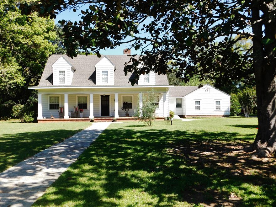 CURRENTLY UNDER CONTRACT, SELLER ACCEPTING BACKUP OFFERS MOVE IN READY - AS IS!  HOME WARRANTY.  PRICE FIRM.  Don't miss this Southern Charmer!  Upgrades include new roof, double pane windows, updated kitchen featuring brick back splash,new custom built gentle closure cabinets and drawers, stainless steel dishwasher, oven, double farm sink, and under counter lighting. French doors open to a 40'x 20' salt water pool & patio. Downstairs bathroom brags of travertine flooring & walls, soaking tub and cedar ceiling. Home has two heating & cooling units and 2 water heaters. Spacious living room, comfortable formal dining sprawls into a cozy sunken den.Spacious bedrooms, two up and two down. The master upstairs suite offers his and her walk-in closets and sitting area.