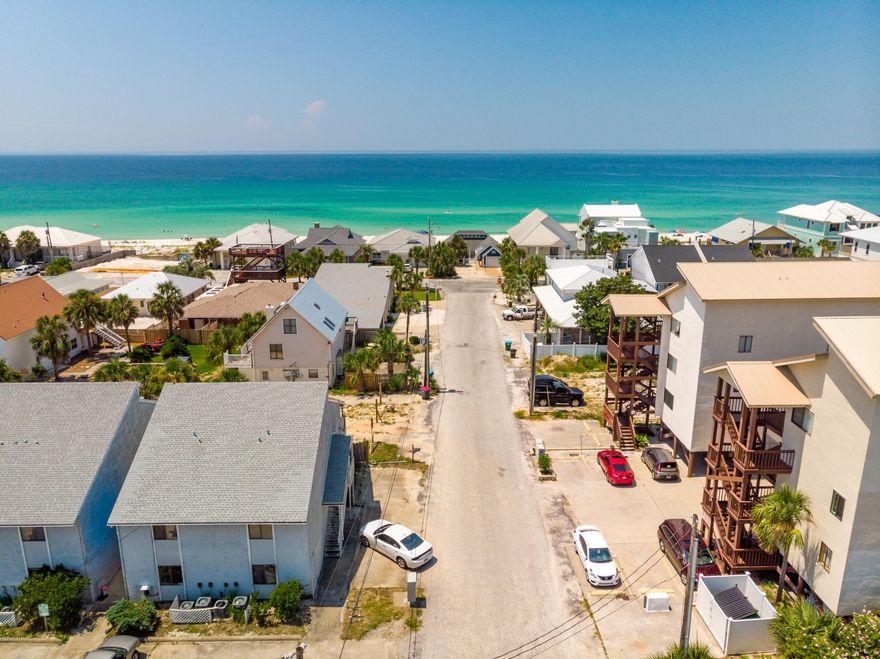 Location! Location! Location!.  Great investment opportunity one block from beach.  This quadraplex has two lower units with 1 bedroom/1 bath.  The upstairs units are one bedroom, large loft on second floor as a second bedroom/bunk-beds and two full bathrooms.  All units have washer and drier hookups and separate electricity meters. Low inventory makes this property highly desirable as a multi unit so close to the beach.  Short term rentals allowed.

Live in one unit and rent the other three out.  Currently all units tenant occupied month to month.