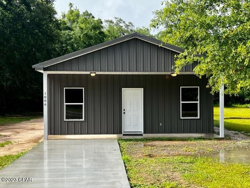 BRAND NEW CONSTRUCTION!!! Home is in the process of being built. All metal is eco-friendly & is 67% recycled. It features a metal roof, metal siding, side by side refrigerator with water & ice maker, central heat/air with heat pump, an electric On Demand water heater, appliances & stained concrete floors. Home meets all current Florida building & energy codes and qualifies for some of the lowest insurance rates in our area! Home features include a 14 x 15 metal outbuilding, spacious front porch, a concrete parking pad with sidewalk & side entrance for convenient unloading of groceries into the kitchen. Additional adjacent parcel is included in the sale.