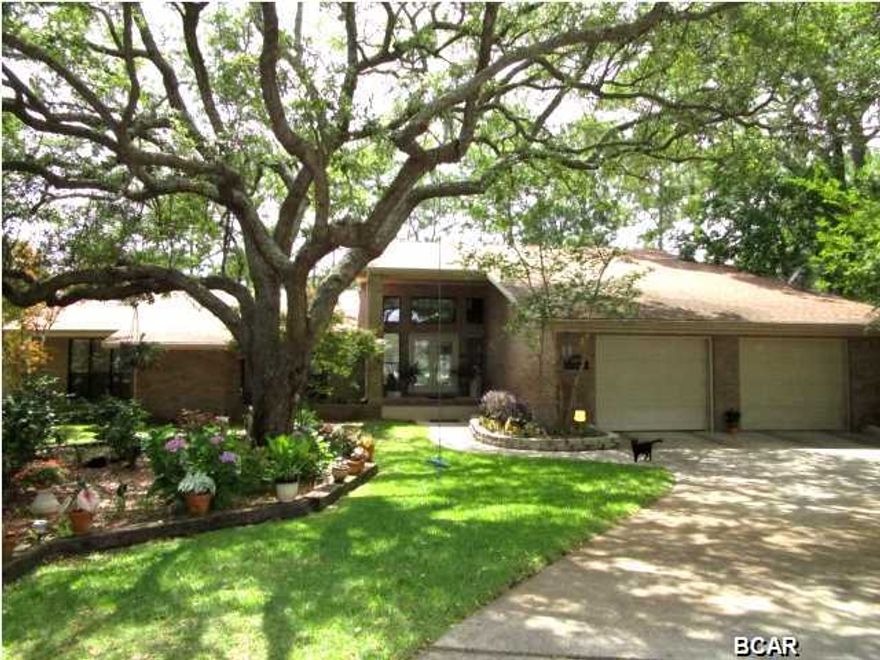 ABSOLUTELY STUNNING ALL-BRICK HOME nestled in the desirable Kings Harbour neighborhood in Kings Point! From the beautiful foyer entrance, the home features a spacious living room with hardwood floors and a barrel-style wood ceiling, large windows for loads of light, and a spiral staircase to a second floor recreational room that could also be used as a fourth bedroom as it has a large walk-in closet. The Master bedroom with its hardwood floors has a brick fireplace and two separate Master baths. The main bath has two walk-in closets, a whirpool tub, vanity and dressing area. A separate room off this bath has a tiled shower and second vanity. The kitchen has been updated with granite counters, stainless appliances and overlooks a dining area with a bay window and separate built-in desk/counter area that also serves as a pass-through to the living area. From the dining area, you will step down into the Sun Room that offers access to the 42-foot long screened porch that encloses the in-ground pool. Or you can step outside this screened porch and enjoy the wood deck that overlooks the pond for ultimate serenity. Outside, there is also a 9.5' x 7' room that houses the pool pump and has shelves and some room for additional outside storage. This home is a must-see to appreciate the uniqueness of this property!