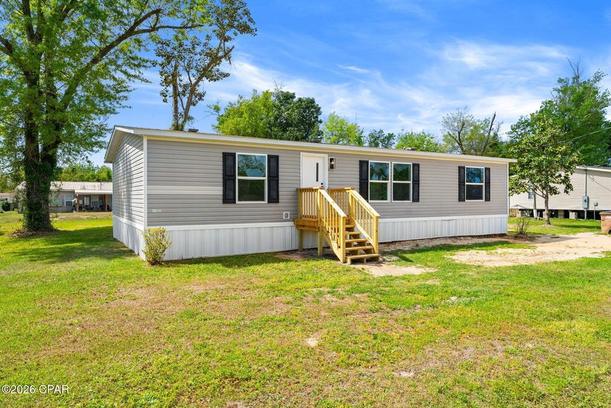 Fully updated 3-bedroom, 2-bath home in Southport offering modern finishes and move-in ready convenience. Enjoy an open-concept layout with new flooring, fresh paint, and abundant natural light throughout. The kitchen features updated cabinetry, stylish backsplash, and ample counter space, flowing seamlessly into the main living area, perfect for entertaining. Spacious bedrooms and refreshed bathrooms provide comfort and functionality. Situated on a large lot with plenty of outdoor space and easy access to Panama City amenities, schools, and Hwy 77. Ideal for homeowners or investors seeking a turnkey property in a growing area.