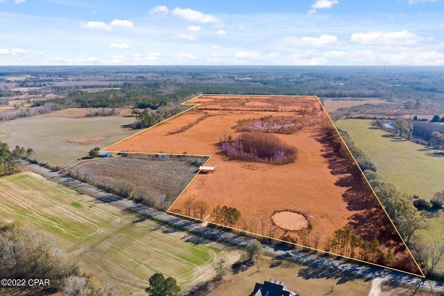 Wow!  This 88.57 acre is a rare find!  Located on a paved road this property is fenced and cross fenced.  Property also has a structure that previously served as a hay barn (32x48).  The possibilities are endless with this one!  Bring your livestock or build your dream home!