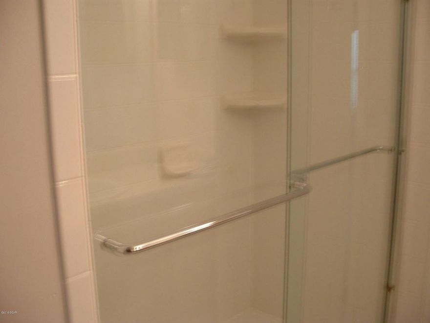 Spacious end townhome, features privacy fenced backyard, open floor plan, dishwasher & Microwave, laminate flooring, & WASHER & DRYER INCLUDED. Close to Gulf Coast State College and Florida State University Panama City Campus