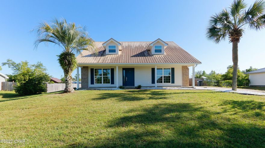 CURRENTLY UNDER CONTRACT SELLER ACCEPTING BACK UP OFFERS - Newly Renovated open floor plan in a beautiful subdivision with close to Sports Park Just NE of Lynn Haven This  2 story 3 bed 2 /1/2 Bath home is elegant with a country feel to it. as you drive up to covered Front Porch. Downstairs Master Suite +  walk in closet .Kitchen has plenty of counterspace and cabinets with all new appliances  The 20 ft ceiling in the living room has shiplap from floor to ceiling with a new modern electric fireplace that can change colors and also puts off heat if needed.  All flooring is new and the upstairs has a Jack and Jill bath with separate vanities and drawers.  New Insulation.  New HVAC and new Ductwork throughout.  Metal Roof and new windows +Brand new Garage door. Has Huge Backyard