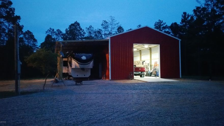 BEAUTIFUL!! 40acres with a gated entrance and a long gravel driveway; 32x48 brand new workshop with 18x48 lean-to, 12x15 electric roll-up door, and a full custom bathroom (includes water heater and tiled shower); $15,000 worth of land clearing around main area; RV hookups; and bonus shed with water and electric. Turkey and deer are in abundance here!