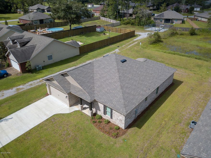 BRAND NEW HOME! 4 Spacious Bedrooms and 2.5 Baths.This home has many Energy Efficient Features All LED Lights, Fully Insulated Interior Walls, Low E windows & much more. The Interior Features warm inviting wall colors sure to match any decore, tray ceilings in the Living room and Master Bedroom, recessed and upgraded light fixtures throughout, vinyl plank flooring, Ceramic Tile and high quality carpet in the bedrooms. The Kitchen is a true show stopper with custom hardwood cabinetry, quarts counter tops, stainless appliances & walk-in Pantry. There is a huge dining area that adjoins the kitchen. The Master suite is very spacious 14x19 &  & has a large master bath featuring his and her double granite topped sink, Jacuzzi tub, separate 5ft shower w/ glass door, linen closet & large walk-in closet 9x11ft! The additional bedrooms are very spacious with large walk in closets in 2 of the rooms & a big reach in double door closet in the 3rd additional room. There is also attic storage with pull down stairs, sprinkler system with Wireless RAIN-CLIK Sensor to auto shut off Irrigation System during rainy conditions. There is also a covered back porch perfect for relaxing or entertaining. There is even an oversize driveway & much more! Make your appointment to view this lovely home today! 1 year Builders Warranty & Fully Transferable Termite Bond Included!  ***All Measurements Approx, Please Measure if needed***