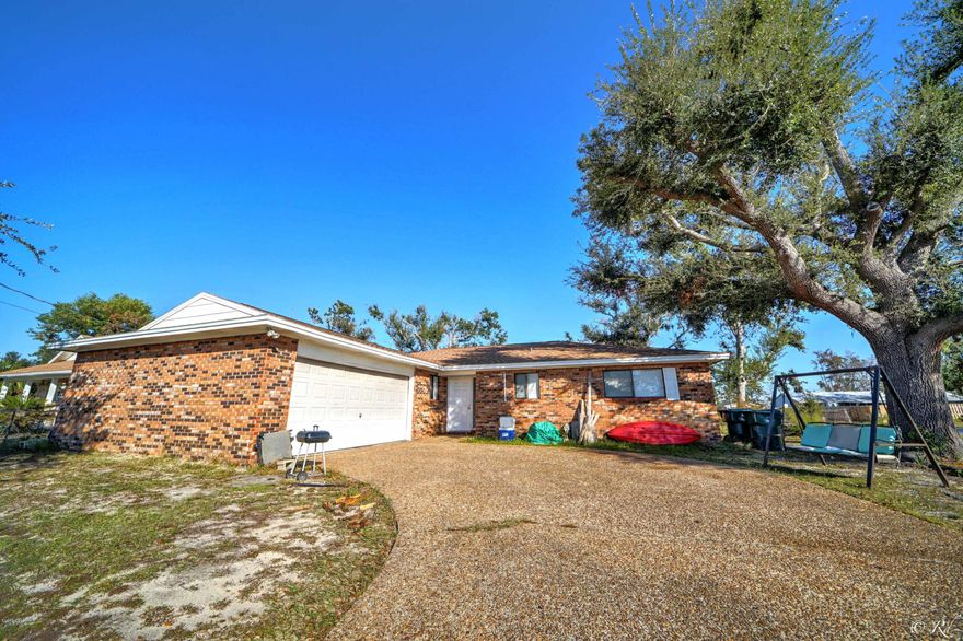 Beautiful Ranch style brick home with garage in Lynn Haven! 3 bedrooms 2 bathrooms, LARGE fenced in yard on a corner lot! within miles of the heart of Panama City and the heart of Lynn Haven!  You dont want to miss this single family home new to the market!