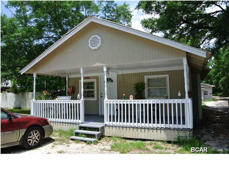 Investment property!  Beautiful large lot.  2 bedroom and 2 bath at the front of property. Duplex is situated behind the home and each of those units is a 1 bedroom and 1 bath.  There is room to build more.