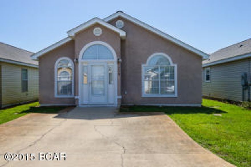 Move in readyThis is a well maintained 3 BR/2 Bath home in the gated neighborhood of Palm Cove. Convenient location in the middle of everything and only about 2 blocks to the beach and 1 block to Shipwreck Island. Built in 2002 with low maintenance in mind. The Seller has taken very good care of the property and added a screen enclosed back porch last year. The water heater was replaced about 1.5 yrs ago, the dishwasher is about 3 years old, and the refrigerator is about 5 years old. The front entry door was recently upgraded to fiberglass and the back door was replaced when Seller purchased.  Located near the entrance to Palm Cove and around the corner from the 2 community pools .Priced to sell.