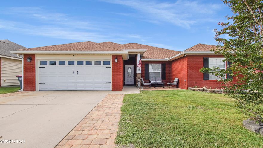 BEAUTIFUL 4 Bedroom/2 bath home with a formal dining/flex space! Located just off East Avenue this home is minutes from Tyndall AFB, restaurants, shopping & more. Inside this split floor plan you will find vinyl plank flooring throughout all common areas, new carpet in the bedrooms, & tile kitchen; Spacious living room featuring built-in shelving, fireplace & crown molding. Kitchen featuring a island/bar, granite countertops, stainless steel appliances, soft close cabinetry, pantry, eat-in area & stone backsplash. Secondary bedrooms feature mini walk-in closets. Master bedroom is very spacious featuring a trey ceiling with crown molding & en-suite featuring whirlpool tub, double vanity's, separate shower, and his/her walk-in closets! Exterior showcases an extended driveway, fresh landscaping, pavered front porch with patio set; fenced backyard, covered back patio, pavered outdoor sitting area, lofted shed with hurricane straps & firepit!  Call to schedule your private showing today!!