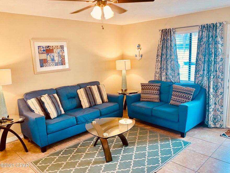 This lovely updated 2 bedroom, 1.5 bath fully furnished townhouse is waiting for you! Both bedrooms have queen size beds, the quest room will definitely fit a bunk or twin also. The master suite has a balcony with a storage room and views of the pool, access to the bathroom from bedroom. Downstairs features your living area, kitchen overlooks the living and dining room with a breakfast bar! Laundry room just outside the kitchen for easy access and of course more storage and a covered patio. New Paint, tankless water heater and the roof is only 3 years old!! This community has several different amenities including pools, playgrounds, a community room, shuffle boards and the most important is the deeded beach access with a beachside pool! You'll want to see this one! Own a piece of PCB!