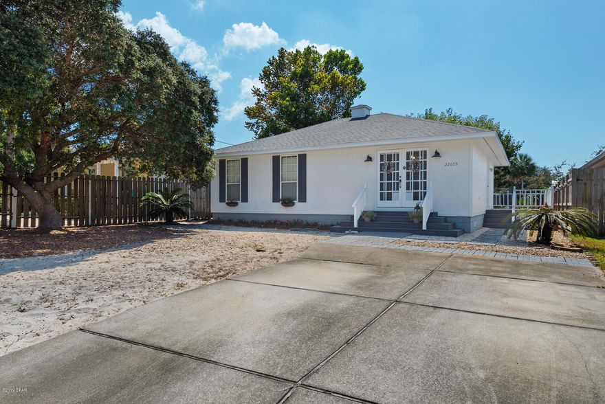 As cute as can be! Located on far West end of Panama City Beach and 597 steps to the beach! 2 bedrooms, 2 baths, real hardwood floors, fenced back yard with fire pit and storage shed. Septic in front so plenty of room for a pool. Great curb appeal and perfect for beach getaway, first time homeowners or retired people. Additional remarks coming soon.