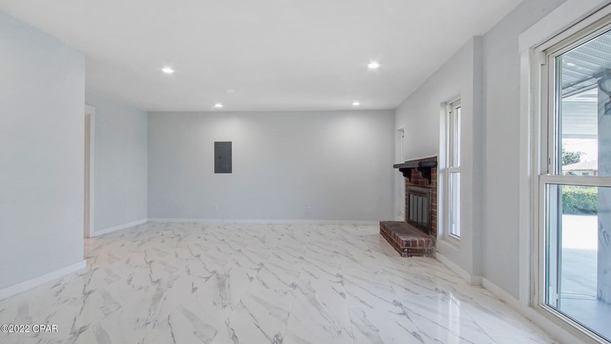 This is a beautiful HOME, all remodeled with newer metal roof, so everything you need is all around you within minutes. It has a very Large Living Room plus a Family Room with a Fireplace. New Kitchen with Custom Cabinetry, (plenty of storage space)with GRANITE counter tops, STAINLESS STEEL APPLIANCES 3 good size Bedrooms, Both Bathrooms updated, Porcelain Tile Flooring Throughout, Privacy Fence.This is home won't last logon the market.Call a Realtor today to schedule a private showing.If important, please verify all measurements.