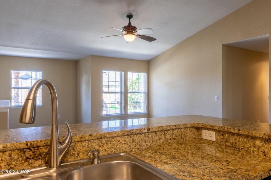 Location, location, location! Come see this rare 4 bedroom 3 bath upstairs unit overlooking the pool in gated Nautilus Cove Condominiums. This unit has high vaulted ceilings, stainless appliances, granite countertops and wood cabinets. Located in building 3 this unit is close to the clubhouse, fitness center and sits directly in front of the resort style pool. Watch the kiddos swim from your living room. Nautilus Cove has BBQ stations throughout the community as well as a playground for the young ones. Located just a couple miles down the road from Pier Park and less than a half of mile to the Emerald waters of the Gulf make this unit a must see. Centrally located in the heart of Panama City Beach, there are restaurants, shopping and entertainment all within a few miles.