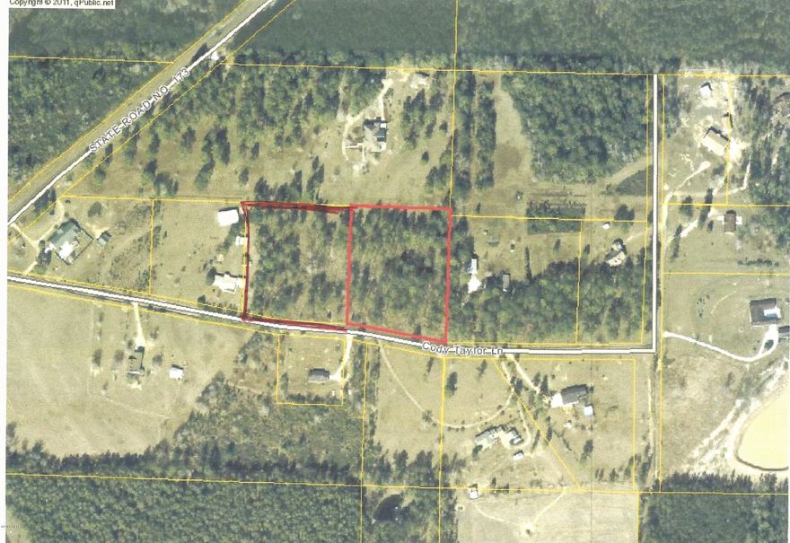 6 Acres Mostly cleared vacant land. Frontage on gravel street.  Short distance to town.