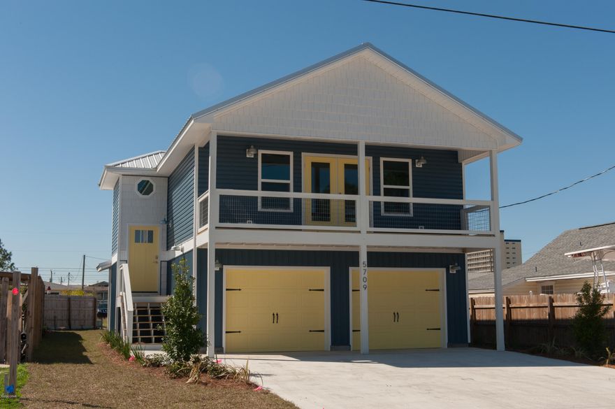 CURRENTLY UNDER CONTRACT, SELLER ACCEPTING BACKUP OFFERS New construction in a magnificent South Lagoon location! Smell the salt air as you step out of your second floor balcony facing Grand Lagoon! Your beautiful new Beach House is nested a quiet golf-cart friendly neighborhood in the South Lagoon area.  Your new home is perfect for the watersports enthusiast, it is just 3 blocks to the Dolphin Street boatramp, with another public access 2 blocks away at the end of Mystic Ave, and only four blocks to the beach.  Kayaking, paddleboarding, and superb fishing are at your doorstep.  Step inside and marvel at the trayed ceilings and beautiful luxury plank floors! The lighting, color palette, finishes and fixtures have been professionally chosen for that perfect Beach House look and feel! The chef in the family will love the beautiful kitchen with soft-close Shaker cabinets, upgraded granite counter tops, tiled  backsplash, and Frigidaire stainless steel appliances! The large master bedroom has treyed ceilings and a his-and-hers closets, and the master bath features double vanities and a lovely shower with floor to ceiling tile and a custom glass door! Impact rated windows mean no boarding up for hurricanes, and spray foam insulation means super low power bills, plus climate controlled and decked storage space in the attic!  Smart Home features are modern and energy efficient LED lighting throughout, WiFi enabled garage door opener, WiFi enabled thermostat, and WiFi enabled irrigation! Designer interior colors, a double car garage, fully sodded and irrigated lot, and wonderful views!
 Construction is complete and this stunning home will not last long, come see it today!