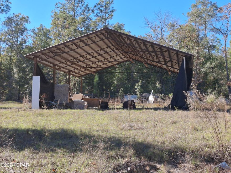Beautiful Wooded and Partially Cleared Building site with a 36x36 Pole barn already built on-site.
Very Well Built with 8x8 Solid Lumber and Metal Trusses. It is open on the sides, front and back. Great space for a camper or anything else you wish to keep under truss /cover.
There is a gate entry and a partial wood fence fronting Grand Quivera Circle.
Just 4.5 Miles to THE COVE at COMPASS LAKE, Fun atmosphere and good food!
Make your HOMESTEAD HERE!!
