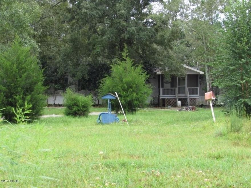 3 bed, 2 bath mobile home located in Youngstown, FL. This home sits on approximately 2 acres of property on a nice dead end street. The home features nice sized bedrooms and a large detached two car, carport. In need of updates and repairs before move in ready. Has great potential!Property is sold in AS-IS condition and WHERE-IS.