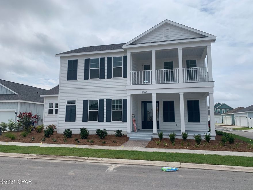 This St. George Florida Cottage style home is our most popular large home offering 5 bedrooms and 4 baths with an optional 6th bedroom. At 3126 square feet, this spacious home has room for a carriage house in the back above the 3-car garage. The property has room for a private pool and outdoor living. Beautiful windows and high ceilings highlight the staircase and double french doors that lead to the covered back porch. There is a gorgeous front porch and two master bedrooms - one upstairs and one on the ground floor. Standard features include granite countertops, a microwave, stainless steel appliances, dishwasher, and garbage disposal. The wonderful amenities at SweetBay include North Bay access for kayaking, canoeing, paddle boarding, pocket parks, a retreat-like swimming pool, basketball court, community walking & jogging trails, an amphitheater and is very pet & people.