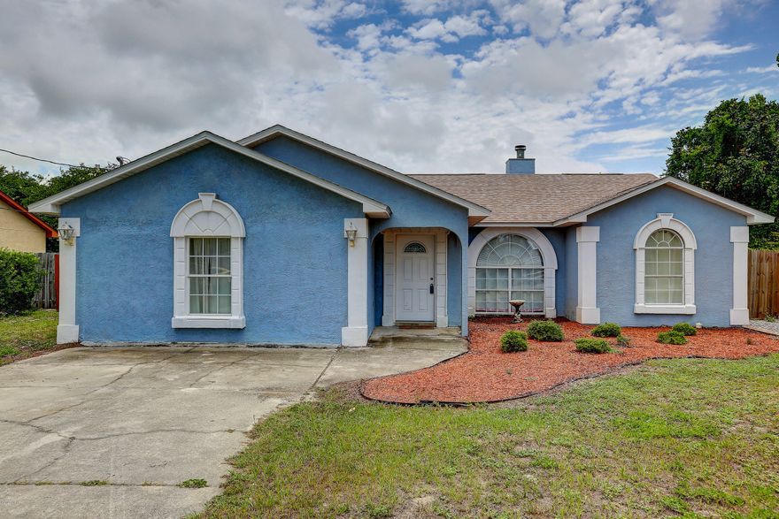 Move in Ready! Amazing kitchen! This beautiful large 4 bedroom plus bonus room 2 bath home located in Gulf Highlands has an open living area and spacious bedrooms. The living room features a high vaulted ceiling,  wood tile floors & gorgeous stone wood burning fireplace with mantle. The kitchen and dining area are spacious. The kitchen features dark hardwood cabinetry, granite countertops, tile backsplash, farm style sink & all stainless steel appliances included. There is also a florida room with large windows which would be the perfect place to relax or entertain for extra space. The Master Suite is spacious & features a private bath. The exterior features a large fenced backyard, patio, storage shed & children New roof, new 18 seer heat pump air conditioner, new stainless steel appliances, new wood tile floors, and new carpet in bedrooms all installed 3 years ago. This home is priced to sell! Make your appointment today! ***All Measurements Approximate, verify if needed.