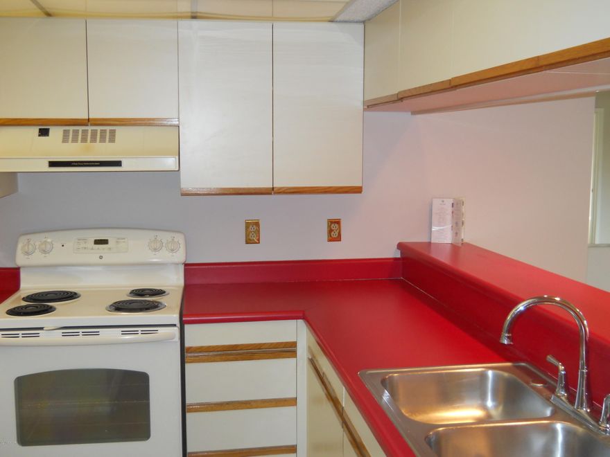 3 Bedroom/3 Bath ground floor unit.  New carpet and fresh paint on walls, ceilings and trim work. Covered porch upstairs.