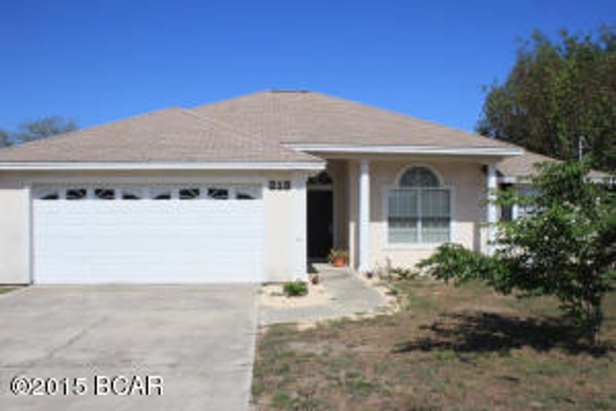 This home, located just minutes from the beach,  has an in ground gunite pool with screen enclosure.  There is an extra large lot 107 X 133 with privacy fenced back yard and extra parking for all your toys or additional guests.  The home was completely painted on the interior in early 2014, new carpet in both bedrooms and new counter tops were installed in the kitchen in 2015.  The home has a large family room with raised ceilings, split bedroom plan, each having its own bath area, and an oversized garage.    A short walk to the Worlds Most Beautiful Beaches.