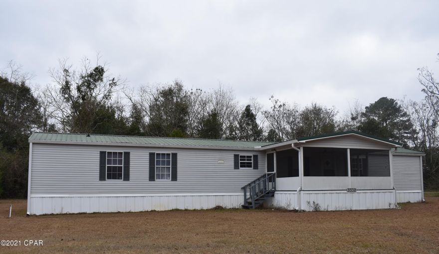This beautifully maintained 16x80 home is located on a paved street with a large yard. Gather together on the large front screened porch or relax on the covered back porch to drink your morning coffee. This home is almost completely furnished with everything a new home owner would need. Make this your new home today by contacting your favorite realtor for a showing!!!!