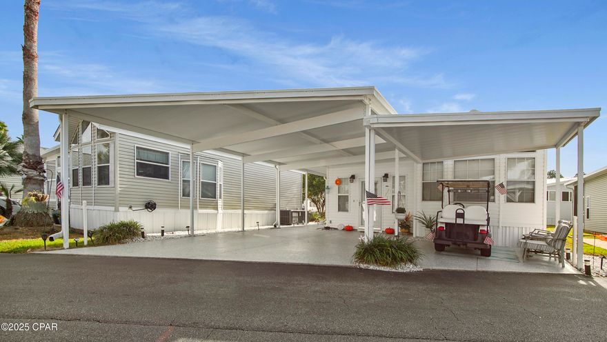 This beautifully decorated home is located in a quiet gated community across from the Naval Base, close to several restaurants, a short distance to St. Andrews State Park and sandy white beaches.
New stainless steel refrigerator, microwave and stove with double oven. AC unit was replaced recently, has a double carport and covered golf cart pad with new ceramic coatings as well as the walkway leading to a large storage/workshop.
This furnished home includes a new king size adjustable bed in a large master bedroom,  separate area with 3 closets . master bathroom has large walk in shower and newly installed commodes in both bathrooms. Custom window treatments throughout the home, nice size dining room as well as a breakfast nook. Step down into the large living room, this unit has a large laundry room with a built in ironing board.
The community offers a clubhouse, exercise workout room, 2 pools with 1 heated seasonal, hot tub, shuffleboard, pond with boardwalk around the entire area, 2 dog walk areas.
The social committee offers weekly and monthly activities, something for everyone to enjoy.
The HOA fees include
water, sewer, trash, cable and lawn care service. On-site office and indoor mailboxes located in the clubhouse.