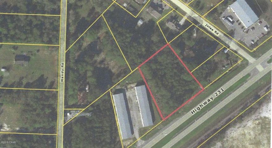Zoned C-3, this 2.32 acre flat site has been cleared and has approximately 259 feet of road frontage on Hwy 231 South. It was previously used as residential and has two sheds at the back of the property. It had electric service at one time and still has a power utility pole on the property. In addition, there is a water well on the property along with two septic tanks, according to the owner, but has not been used in many years.