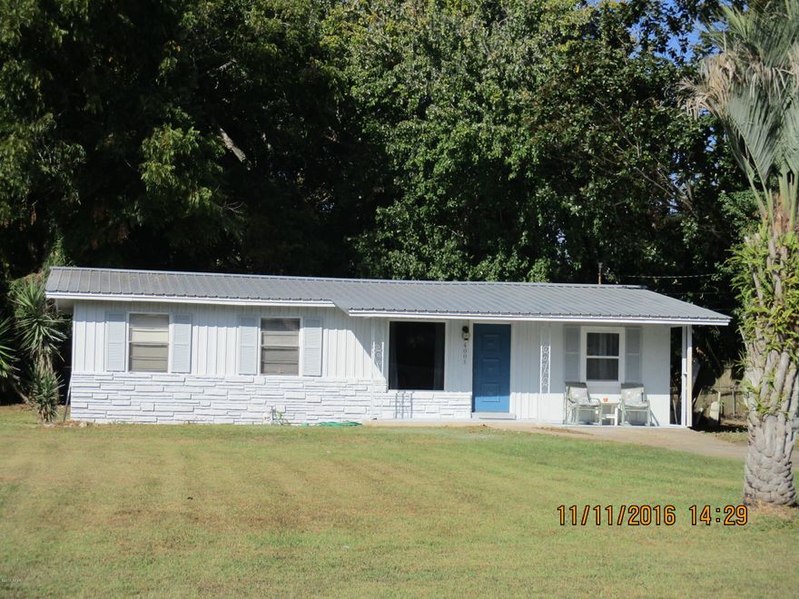 A Doll House recently remodled, freshly painted move in condition. New metal roof, tile flooring, granite counter tops, new appliances just to mention a few updates. Sellers disclosure will give more details. This neat home located near everything you would need and minutes to the beach. Features include a greatroom with a beamed catherdral ceiling, dining and fully equipped kitchen with a breakfast bar and plenty of cabinets. Split bedroom plan with a master suite, new bath room and launtry room. 3 additional bedrooms and a full bath. Large lot with a beautiful shaded backyard with pecan trees, elms and shrubbery. Very private.  Low maintanance home ready for you all the work has been done. Will consider reasonable offers