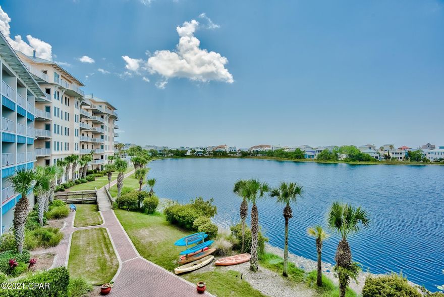 Carillon Beach Inn is perfectly located on the west end of Panama City Beach with quick access to Pier Park, Northwest Florida Beaches International Airport (ECP), Lake Powell, and all that 30A has to offer. Take advantage of all the great amenities in Carillon Beach Resort with over 3,900 ft. of sugar white sand beaches, 4 community pools, 2 hot tubs, tennis, yoga studio, fitness center, retail shopping & dining at Carillon Market Street. Enjoy outdoor activities such as bike rentals, kayaking, paddle boarding, snorkeling, fishing and much more. Unit 307 is a third floor unit with direct access to a covered balcony with serene views of Lake Carillon from the bedroom. This unit features luxury vinyl plank flooring throughout with tile in the kitchen & bathroom. The kitchen features granite countertops, stainless steel appliances, and a great breakfast bar. Several large sliding glass windows give the unit great natural light and beautiful outdoor views of the lake can be enjoyed from the bedroom. The bedroom also features a king bed with recessed lighting above. This condo would make a fantastic rental investment or private beach getaway!