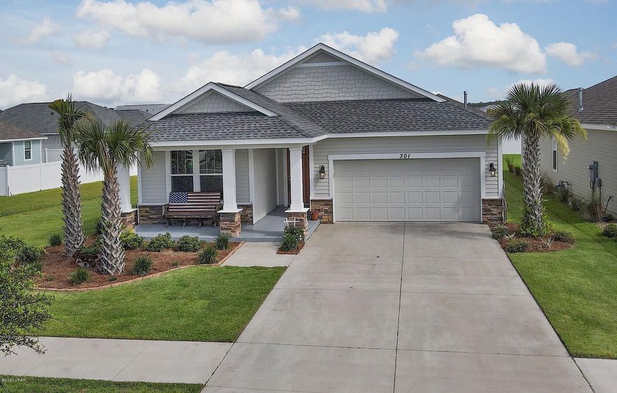 Excellent opportunity to purchase a beautiful home on a premium lot with upgraded master bath, wood like tile flooring, beautiful backsplash and a lot more. Located in the well-sought-after community of Breakfast Point near the beach, where your kids can walk to school. This is a lovely master planned neighborhood, quiet and family oriented. LOCATION! Groceries, dining, and shopping all within a golf cart drive & only 5 miles from Pier Park and 1.2 miles from the Beach. Samuel Taylor Homes is truly one of the best builder in Bay County resulting in energy efficient cat 5 rated homes. Schedule your showing now! They insulate most of the interior walls to make a very quiet home. SS appliance package is standard, along with brushed nickel faucets, security system, 8 ft. Doors throughout, granite counters in kitchen and baths, raised vanities with under mounted porcelain sinks, oversized tiles, upgraded carpet with 8 lb. padding and much more.