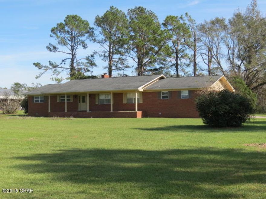 Reduced!   Looking for a home in the country but just minutes from town?  Wanting a home close to Panama City Beach? Well here it is. Beautiful home has been renovated over the past few years.  Eat in kitchen and dining with a beautiful fireplace.  Attached sun room which overlooks a huge back yard. This 3/2 is absolutely beautiful. Make your appointment today!