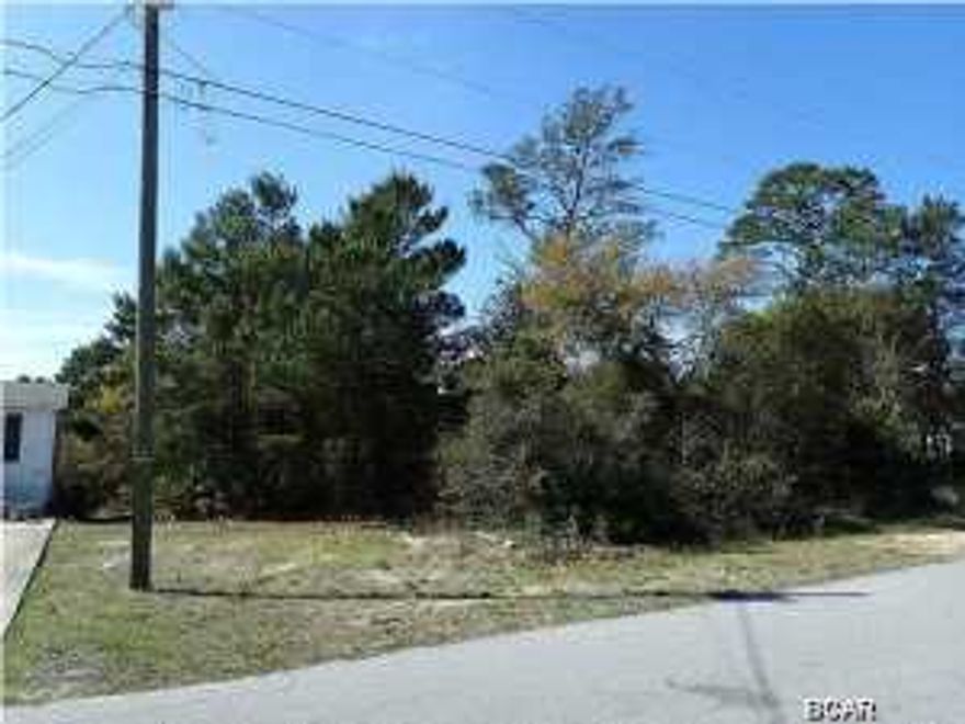 Large lot in High Ridge Estates on the west end of Panama City Beach. 4 bedroom Mobile Home next door is available as well MLS #630101.