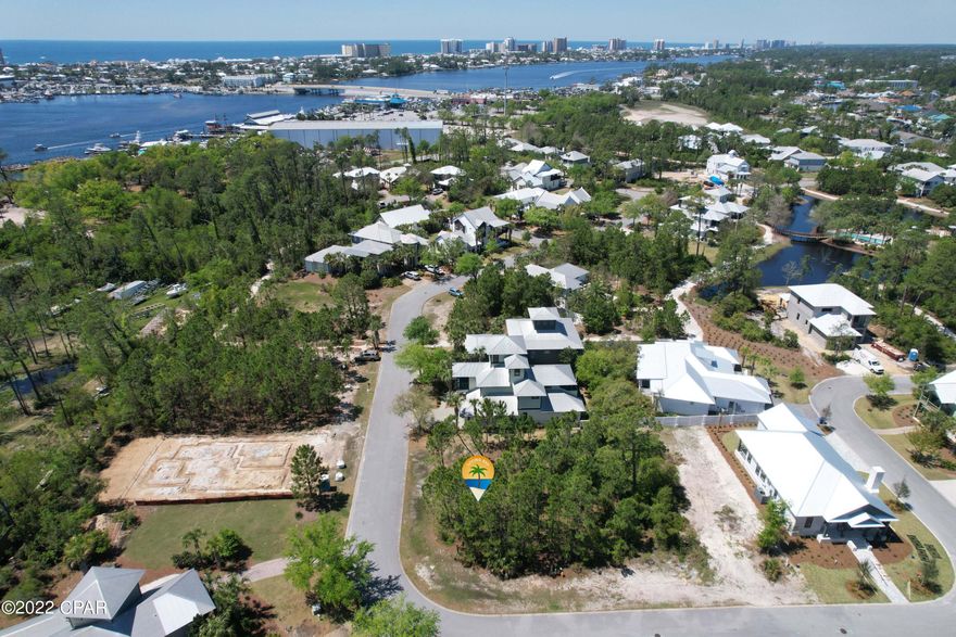 What do you get when you put a vacant CORNER lot for sale in an established GATED neighborhood in the perfect location? If you know MARTINIQUE, you know where the ''West Indies look'' abounds! You also know the answer to the question is ''A HAPPY BUYER''! Panama City Beach happens to have some of the BEST restaurants within walking distance of this subdivision. If you are not ready to build just yet, this lot is a great investment for ''later''-
