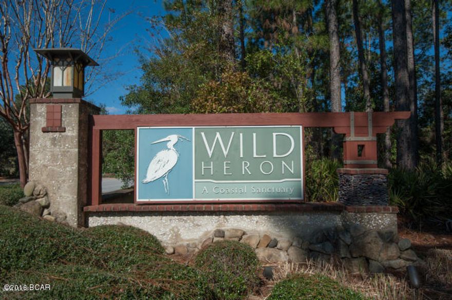 ***BANK OWNED***AMAZING LARGE CORNER LOT IN WILD HERON***BACKS UP TO CONSERVATION AREA*** LOCATED ON A QUIET CUL-DE-SAC WITH ROAD FRONTAGE ON 2 SIDES.  WILD HERON IS BEAUTIFULLY MAINTAINED WITH AMENITIES TO INCLUDE LAKE POWELL ACCESS, WITH CANOES/KAYAKS, BOATHOUSE, POOL, FIRE PIT, AND FITNESS FACILITY. JUST MINUTES TO THE BEACHES AND 30-A.  SELLER OFFERING 3.5% INTEREST ON A 5/1 ARM, 11% DOWN PAYMENT, NO PMI, WITH APPROVED APPLICATION.