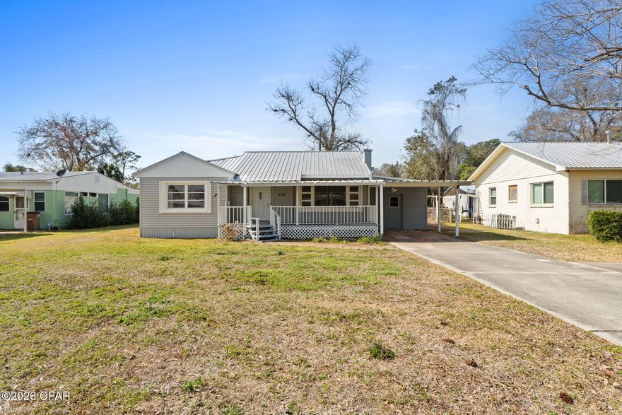 CHARM.SPACE.LOCATION!!  A rare find with true character & craftsmanship you don't see every day, 608 Garrison Ave offers timeless appeal in an unbeatable in-town location. Lovingly cared for by the same owner for nearly 60 years, this well-built 3 bedroom/2 bath home showcases beautiful original woodwork, rich paneling, custom built-ins & quality materials that have truly stood the test of time. From the warm wood accents & exposed beams in the spacious family room to the thoughtfully designed shelving & storage throughout, there's a sense of history & heart here that's hard to replicate. You'll find generous living spaces with room to spread out & make it your own. The kitchen offers ample cabinetry & workspace, while the adjoining living & dining areas provide flexibility for everyday living or hosting family & friends. The layout gives you options--whether you envision preserving its vintage charm or adding your own modern touches, the solid foundation & craftsmanship are already in place. Step outside & discover even more potential. The backyard offers great space for entertaining, gardening or simply relaxing in the coastal breeze. There's plenty of room for boat parking, making it ideal for those who love getting out on the water. Whether you're looking for a primary residence, a weekend getaway, or an investment opportunity, this property checks the boxes for charm, location & value. A short golf-cart ride to downtown puts you right in the heart of Port St. Joe. Cruise into town for dinner, boutique shopping or local events, then head to the bay to catch a breathtaking sunset or fish off the pier. Enjoy easy access to St. Joseph Bay, the Gulf beaches, parks, & marina--all just minutes away. For the size & location, this is one of the most affordable opportunities in Port St. Joe. Homes with this kind of character & history rarely come along. Call for your private tour & LIVE THE BEACH LIFE!