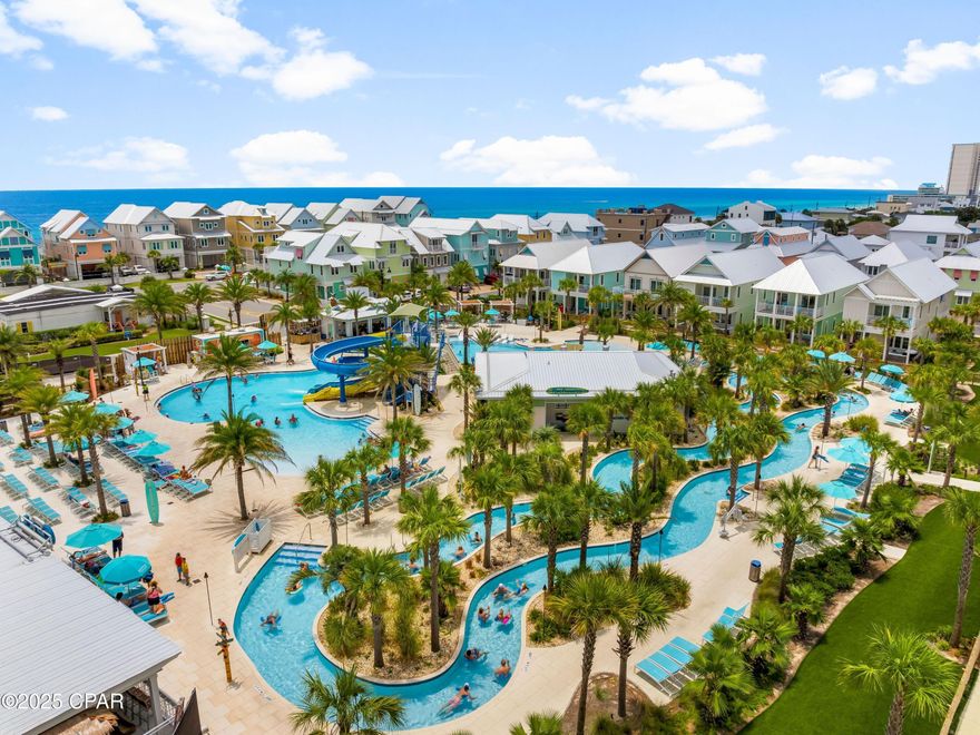 This stunning almost-new home enjoys a prime coastal location in the acclaimed community of Margaritaville Beach Cottage Resort, Panama City Beach's newest luxury resort. Located just yards from gated beach access and the community pool complex, this beautiful beach cottage has magnificent gulf views from the second and third floor balconies. Built in 2023, this fully furnished Key-West-style home has a cocktail-inspired color palette with an open concept layout that's ideal for relaxing and entertaining. It showcases a host of attractive design features, including stylish shiplap walls and a first-floor guest suite. The fully fenced backyard creates a private oasis with low-maintenance turf and a covered porch with a private hot tub for lazing away the days in total relaxation. Indoors, practical wood vinyl laminate flooring complements the white kitchen cabinetry with dark blue tile accents as a backsplash. Four tall chairs are lined up around the breakfast bar with extra seating in the dining area. The open sitting room is a social space complete with a wet bar and a beverage refrigerator. Three floors of accommodations offer multiple porches and balconies for hanging out in the sun. Just add friends, cool drinks and a good book. Five generously sized bedrooms all have lots of light and storage, while four luxury bathrooms and a half bath have a sleek contemporary finish. The top floor includes a game room and a bunk room that's sure to be a big hit with young guests. An exterior spiral staircase provides easy access from the bedrooms to ground level for those eager to get out for a morning stroll before breakfast. Offered turnkey, this gorgeous beach cottage is rental-ready for owners or investors looking to welcome their first guests. This incredible beach house has two dedicated parking spots and direct access to the resort's zero-entry Oasis pool and a heated infinity pool for year-round fun. By day, the water slides and 425-foot lazy river offer cool activities for all ages right next to The Salty Rim Bar and Grill. After dark, the resort buzzes with dining options and nightlife, including movie nights and live entertainment seven nights a week. Just minutes from Pier Park shopping and dining, this home is superbly located for exploring everywhere on foot. Close to golf, entertainment and family attractions, it is also conveniently close to Northwest Florida Beaches International Airport (ECP) for weekend getaways.
