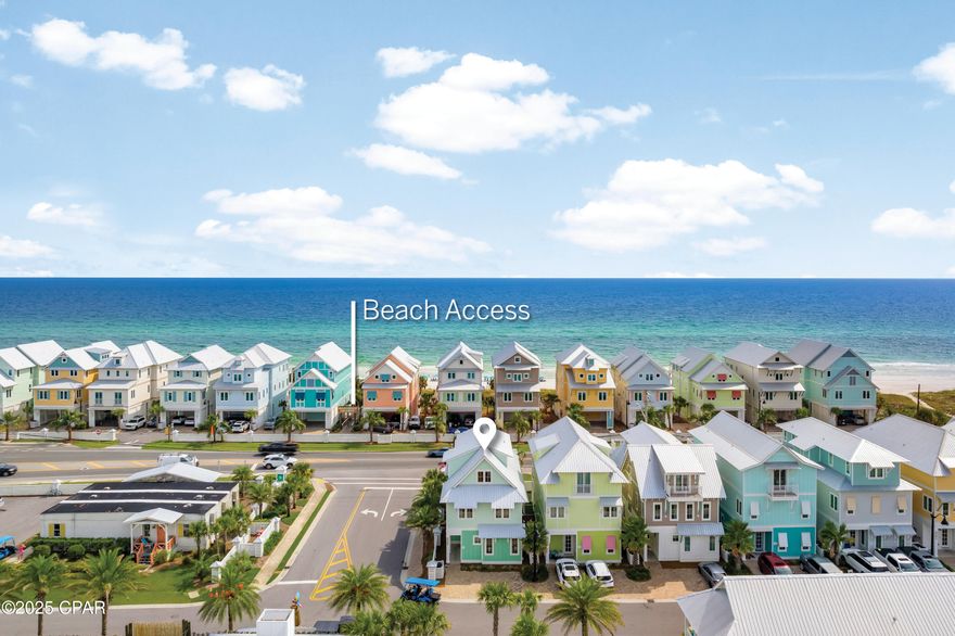 This stunning almost-new home enjoys a prime coastal location in the acclaimed community of Margaritaville Beach Cottage Resort, Panama City Beach's newest luxury resort. Located just yards from gated beach access and the community pool complex, this beautiful beach cottage has magnificent gulf views from the second and third floor balconies. Built in 2023, this fully furnished Key-West-style home has a cocktail-inspired color palette with an open concept layout that's ideal for relaxing and entertaining. It showcases a host of attractive design features, including stylish shiplap walls and a first-floor guest suite. The fully fenced backyard creates a private oasis with low-maintenance turf and a covered porch with a private hot tub for lazing away the days in total relaxation. Indoors, practical wood vinyl laminate flooring complements the white kitchen cabinetry with dark blue tile accents as a backsplash. Four tall chairs are lined up around the breakfast bar with extra seating in the dining area. The open sitting room is a social space complete with a wet bar and a beverage refrigerator. Three floors of accommodations offer multiple porches and balconies for hanging out in the sun. Just add friends, cool drinks and a good book. Five generously sized bedrooms all have lots of light and storage, while four luxury bathrooms and a half bath have a sleek contemporary finish. The top floor includes a game room and a bunk room that's sure to be a big hit with young guests. An exterior spiral staircase provides easy access from the bedrooms to ground level for those eager to get out for a morning stroll before breakfast. Offered turnkey, this gorgeous beach cottage is rental-ready for owners or investors looking to welcome their first guests. This incredible beach house has two dedicated parking spots and direct access to the resort's zero-entry Oasis pool and a heated infinity pool for year-round fun. By day, the water slides and 425-foot lazy river offer cool activities for all ages right next to The Salty Rim Bar and Grill. After dark, the resort buzzes with dining options and nightlife, including movie nights and live entertainment seven nights a week. Just minutes from Pier Park shopping and dining, this home is superbly located for exploring everywhere on foot. Close to golf, entertainment and family attractions, it is also conveniently close to Northwest Florida Beaches International Airport (ECP) for weekend getaways.
