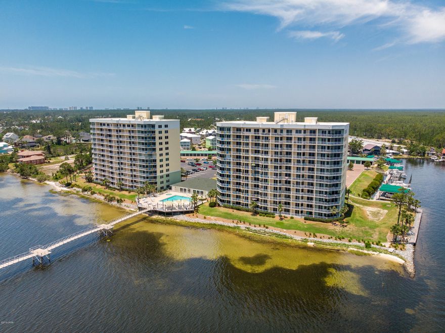 This spacious and bright unit has an open floor plan with lots of natural light. Master bedroom is waterfront with sliding door access to the spacious balcony, that is approx. 203 sq. ft. There is access to the balcony from the main living area as well. The balcony provides expansive views of St. Andrews Bay plus the Intracoastal Waterway. Hibiscus By The Bay is a waterfront community especially designed for recreational boaters, fisherman and it has its own marina. This is a gorgeous first class waterfront community situated on an elevated 10 acre peninsula with 600 feet of water frontage on beautiful St. Andrews Bay.  Plan to see this unit today! All measurements are approximate, Buyer to verify if important