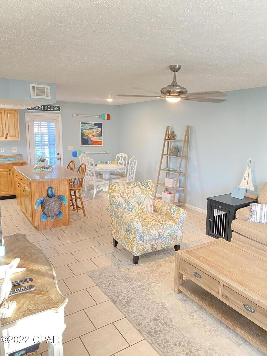 MONEY MAKER!! IN THE HEART OF PCB. Perfect for an investor or a personal beach home.

This 2 Story townhouse is walking distance to the beach, Freshly painted, selling with beautiful furniture and decor. 

The 1st floor has Tile floors with a 1/2 bath, beautiful large kitchen with an island/breakfast bar, separate dining area, washer and dryer, and a covered back patio. 

There are 2 large bedrooms upstairs, with a full Tub/shower combo. Balcony off the master suite over looking the grounds and pool with a large storage room.

LOW  HOA's, 2 assigned parking spaces

This is a current working and profitable Air BB. Do Not MISS OUT!

Please do not disturb the tenants on their vacation.