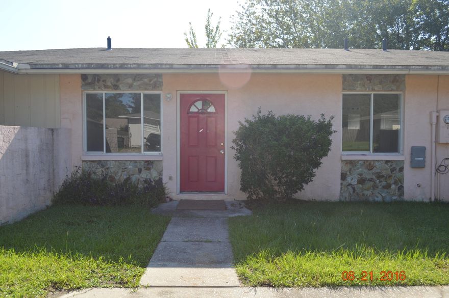 2 bedroom 1 bath unit in triplex conveniently located in Lynn Haven. Just painted, new carpet, new vinyl. Close to everything. Unit has central heat and air, w/d hook up, dishwasher. Yard care included. No pets please.