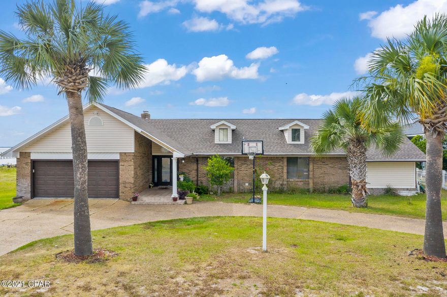 'CURRENTLY UNDER CONTRACT, SELLER ACCEPTING BACKUP OFFERS' ! Beautiful waterfront traditional style home in a prestigious neighborhood. A breathtaking sunsets can be viewed from the covered porch or pool.  Call today to make your appointment.