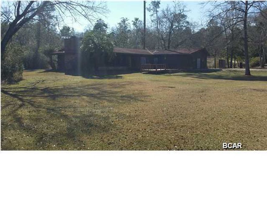 All sizes are apx---W-A-T-E-R-F-R-O-N-T---OVER 600 FT ON BEAUTIFUL BEAR CREEK--VERY RUSTIC AND SECLUDED LOCATION--OVER 9.09 ACRES (SOME WOODED BUT MOSTLY CLEARED) VERY QUITE AND PRESTINE SETTING---FISH AND SWIM ON YOUR PROPERTY--HOME HAS 4/2 BEAUTIFUL HOME WITH RUSTIC SIDING AND A TILE ROOF-LOTS OF DECKS---WITH LOTS OF ROOM TO ENTERTAIN WITH VIEWS OF THE CREEK!!!SUPER LOCATION TO RAISE YOUR HORSES---NOT TO FAR OUT OF TOWN--THIS IS YOUR DREAM HOME TO RAISE A FAMILY WITH PEACE AND QUITENESS----ONE OF A KIND!!!!! A MUST SHOW!!!