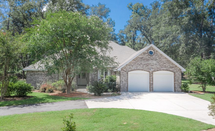 This meticulously maintained brick beauty is move in ready and a must see! Situated on a 2.1 acre lot minutes from town sits this 4 bedroom, 3 bath rare find that boast 10 foot raised ceilings, spacious living room with an abundance of natural light, formal dining area and an eat-in kitchen with island overlooking the stone fireplace. The expansive master suite features French doors that lead to the back porch, his/her vanity, skylight, deep soaking tub, separate shower, and large walk-in closet. Additional bedrooms share a jack-n-jill bath while the 4th bedroom located on the opposite side of the home could serve as a game room or office. Enjoy a cup of coffee inside the enclosed patio, pruning the luscious landscaping or tinkering inside the 24x36 enclosed barn with roll up doors. This property is secluded down a dead-end road just minutes from Interstate 10 and Hwy 77.