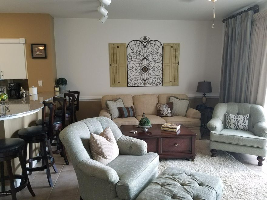 This is a remarkable unit at Shores, the owner is a Interior Designer from Tennesee and you will see the improvements upon walking in the front door. You will see the embellishments on the kitchen and bathroom cabinets, moulding, light fixtures, faucets, exquisite drapery in living room and master bedroom. The L floorplan at Shores is the most popular interior floorplan at Shores with a bunk room large enough to boast a queen bed and a double balcony with the master facing the Gulf. It is also the only unit floorplan at Shores that has a double vanity in the master bedroom. Designer wallpaper in guest bedroom and all the other appoinments makes this unit like no other at Shores.......