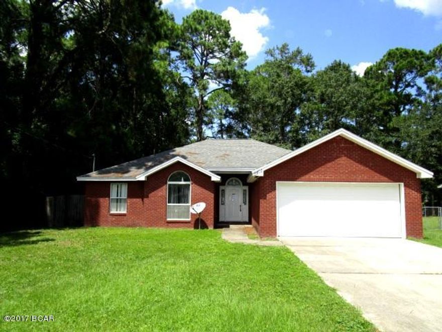 VERY WELL MAINTAINED HOME situated on a quiet street and centrally located near Tyndal AFB!  This home boasts a Great room with a fireplace and laminate wood floors; and a kitchen with all appliances, ceramic tile flooring and an eat-in dining area.  The split-bedroom plan features a large Master bedroom with a trey ceiling and a large Master bath with a whirlpool tub, separate shower and water closet.  The two additional bedrooms are conveniently located next to the full guest bath, and the laundry room has both a washer and dryer.  The back of the home has a covered patio, fenced yard and a storage building.  This home should have no problem with financing!