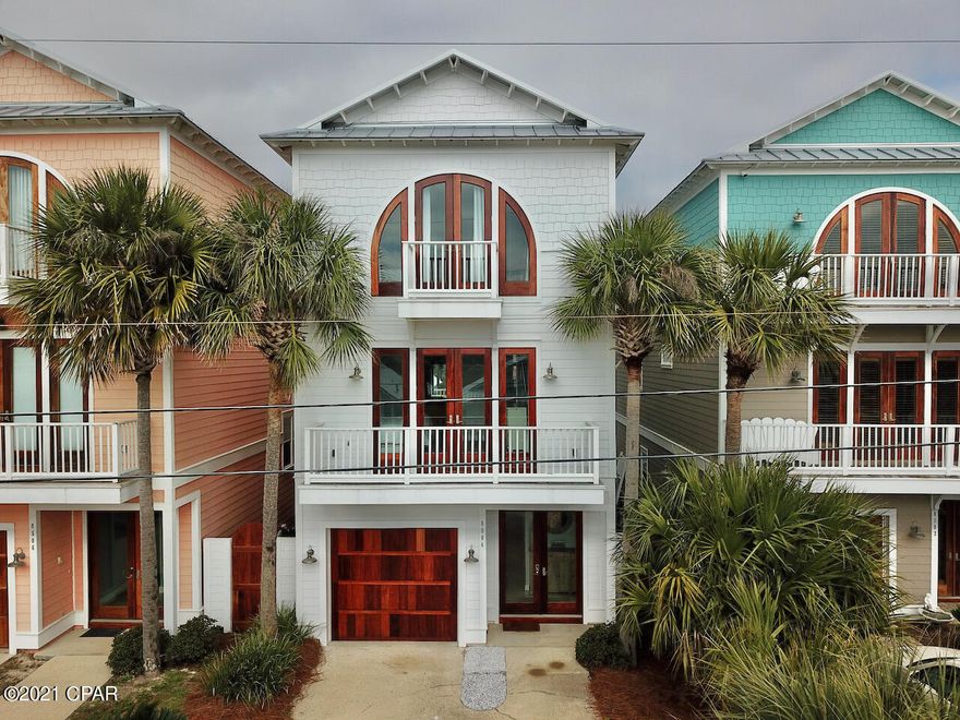 CURRENTLY UNDER CONTRACT, ACCEPTING BACK UP OFFERS. A refined sophistication best describes this beautiful WATERFRONT home overlooking Grand Lagoon. Suited for full time living, vacation rental or a second home retreat! 4 beds/4 baths, over 3500 square feet of modern living which includes ALL furnishings. Hydraulic elevator services all three levels. Outdoor space offers gorgeous inground pool w/large deck...swim up bar seating & sun shelf, private 12' x 24' boat dock with 10,000lb lift. Ground level presents stunning Marble floors taking you to a bedroom (with no closet), full bathroom and large living/flex space that could be an office or game room! The second level brings an amazing open living area and Gourmet Kitchen complete with large breakfast bar, Stainless Appliances, 6-burner gas range with hood and granite throughout. Enjoy any meal at the dining area overlooking the pool out to the Lagoon. Also, includes one bedroom and full bathroom. Upstairs to the third level dons the Master bedroom and ensuite with a spa-like steam shower, jetted tub, his and her vanities and an amazing walk-in custom closet with mirrored dressing area. Large master accommodates a nice sitting and walkout balcony incredible views. There is an additional bedroom with full bathroom. Every inch of this home has been touched with just amazing finishes. So much to see. Enjoy waterfront living with easy access to beautiful white sand beaches, shopping, entertainment, fine dining and only a few minutes away from St. Andrews State Park or travel by boat from your private dock to the open waters of the Gulf of Mexico.