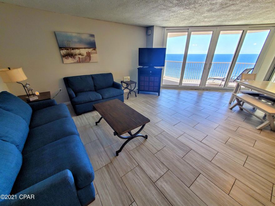 Rental projections of 56k. Beautifully remodeled 2 bedroom deluxe condo. Fantastic gulf views. Oversized balcony that offers enough space for a dining table and chairs to eat dinner while watching the sunset. The kitchen is completely remodeled. This condo offers custom cabinets, granite countertops, tile floors through out, stainless steel appliances, washer and dryer and much more. The brand new sliding doors and windows were just installed this spring adding a tremendous value to the new buyers. The Dunes of Panama offers 3 Pools, Tennis Courts, Basketball, Free WiFi, Fitness room, Volleyball, Shuffleboard, Outdoor BBQ grills, Deli and Souvenir Shop. Chair and Beach rental services, and much more. Measurements are appx. Please verify if important.